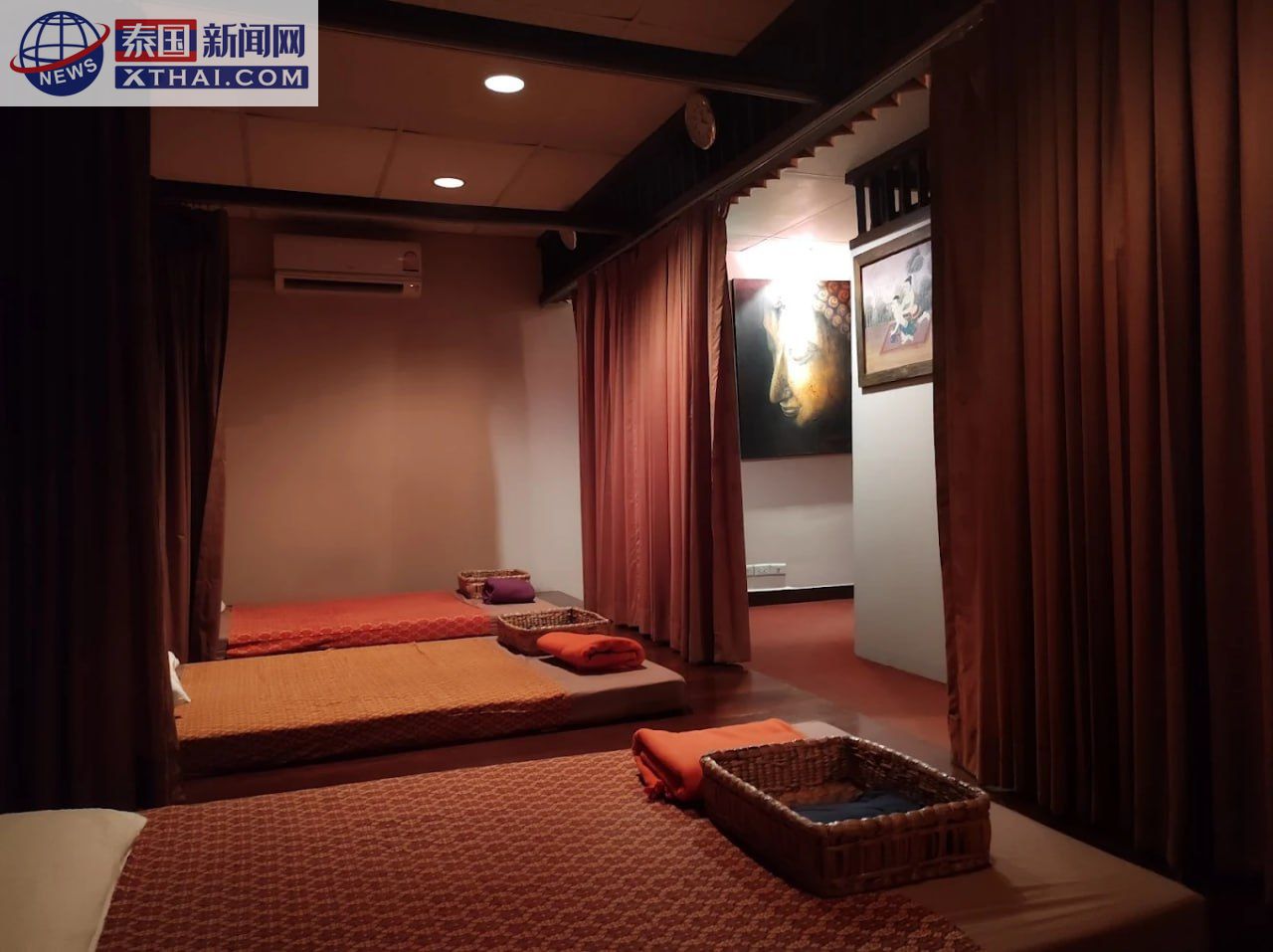 Laks Thai Massage技师服务场景，展示正宗抓龙筋手法